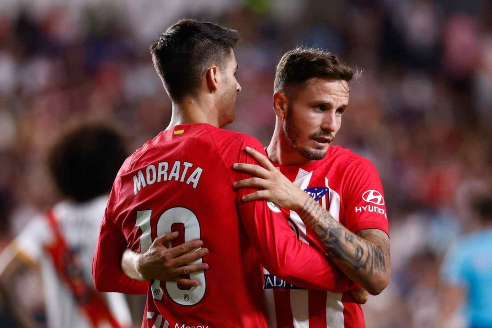 Álvaro Morata y Saúl celebrando un gol