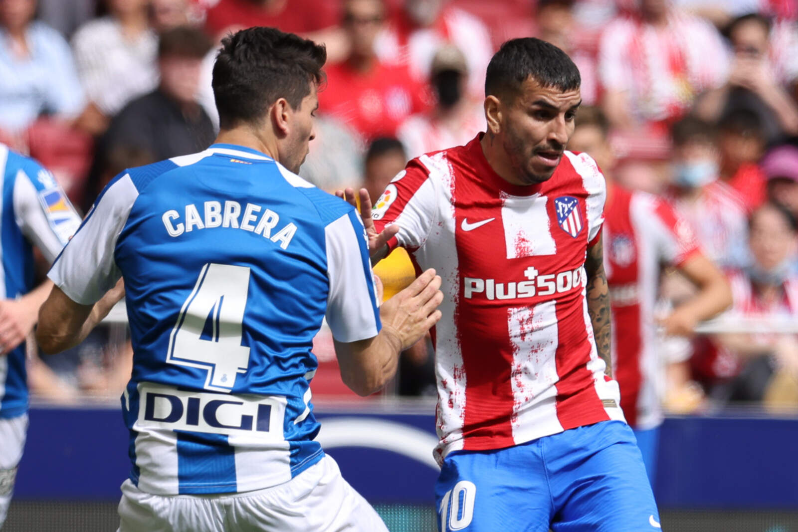 Ángel Correa junto a Cabrera en un Atlético - Espanyol